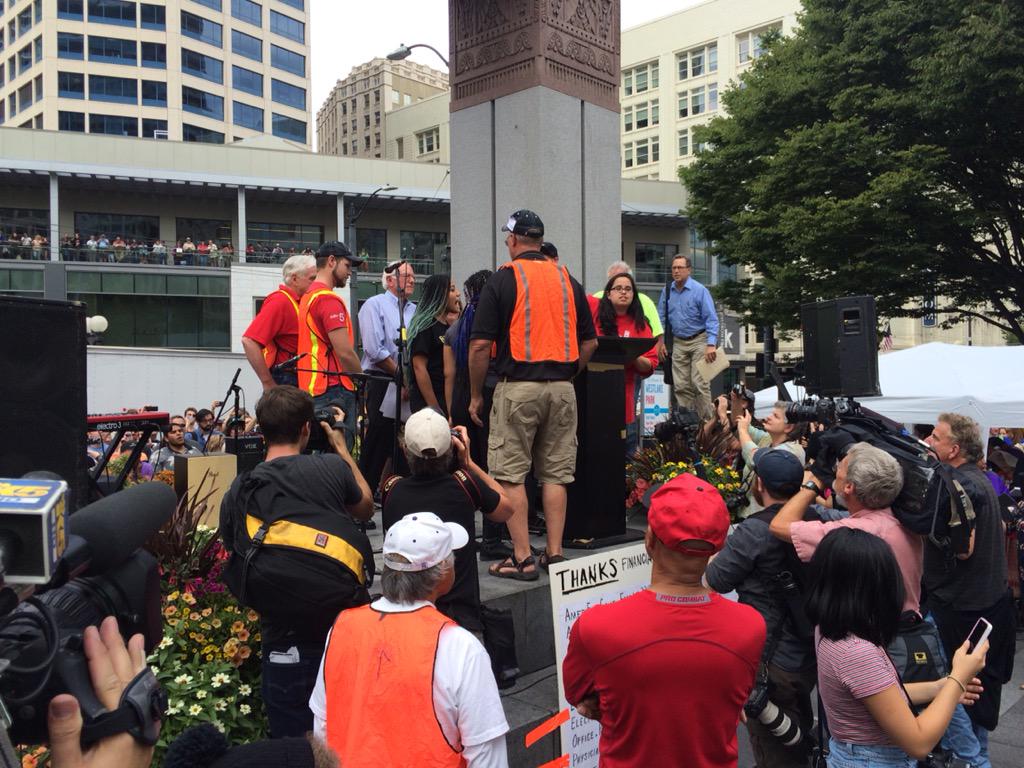 Black Lives Matter protestors jump the stage, interrupting <a href="/SenSanders/">Sen. Bernie Sanders</a>.