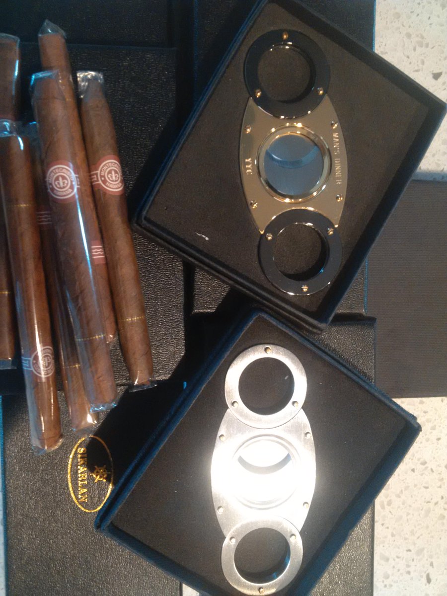 MansDinnerYYC's tweet photo. Recap: a lil gift for the boys. Custom #mansdinneryyc Cigar Cutters. Don't worry @jessemancini I got urs with me. http://t.co/KUV2PWQs0T