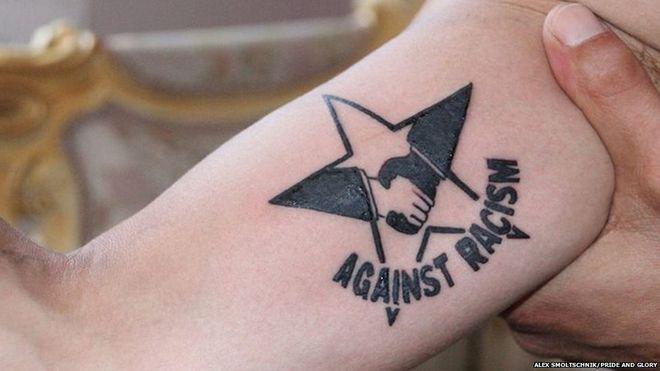 BBCMonitoring's tweet photo. Tattoo artist in Austria offers free anti-racism inkings http://t.co/HkIIigczb6 #NewsfromElsewhere http://t.co/GGjYSk2wIl