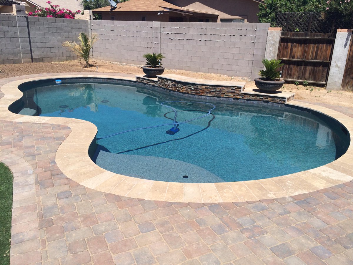 ThunderbirdPool's tweet photo. Pool just finished, with @Pebble_Tec "Blue Granite" Pebblesheen. #Phoenixpoolbuilder #custompools http://t.co/JbD2k9IK4y