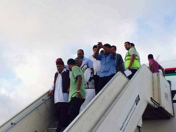 SaddiK_MohameD1's tweet photo. #Libya'n ex FM came out innocent in today's trial where many sentenced dead ,he arrived safely at #Labrag airport http://t.co/LDt6NwGWPZ