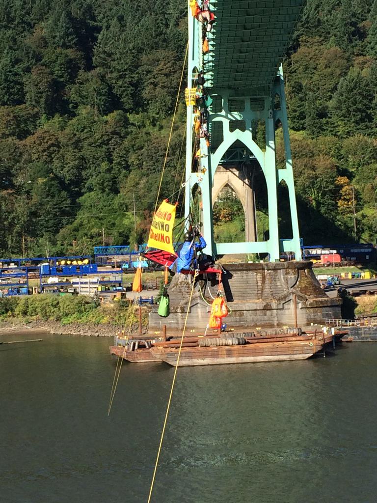 DanEnviroCannon's tweet photo. Climbers are waking up slowly from morning naps. The sun is warm but the wind off the water is a bit chilly. #ShellNo http://t.co/QfmGpM6CD9