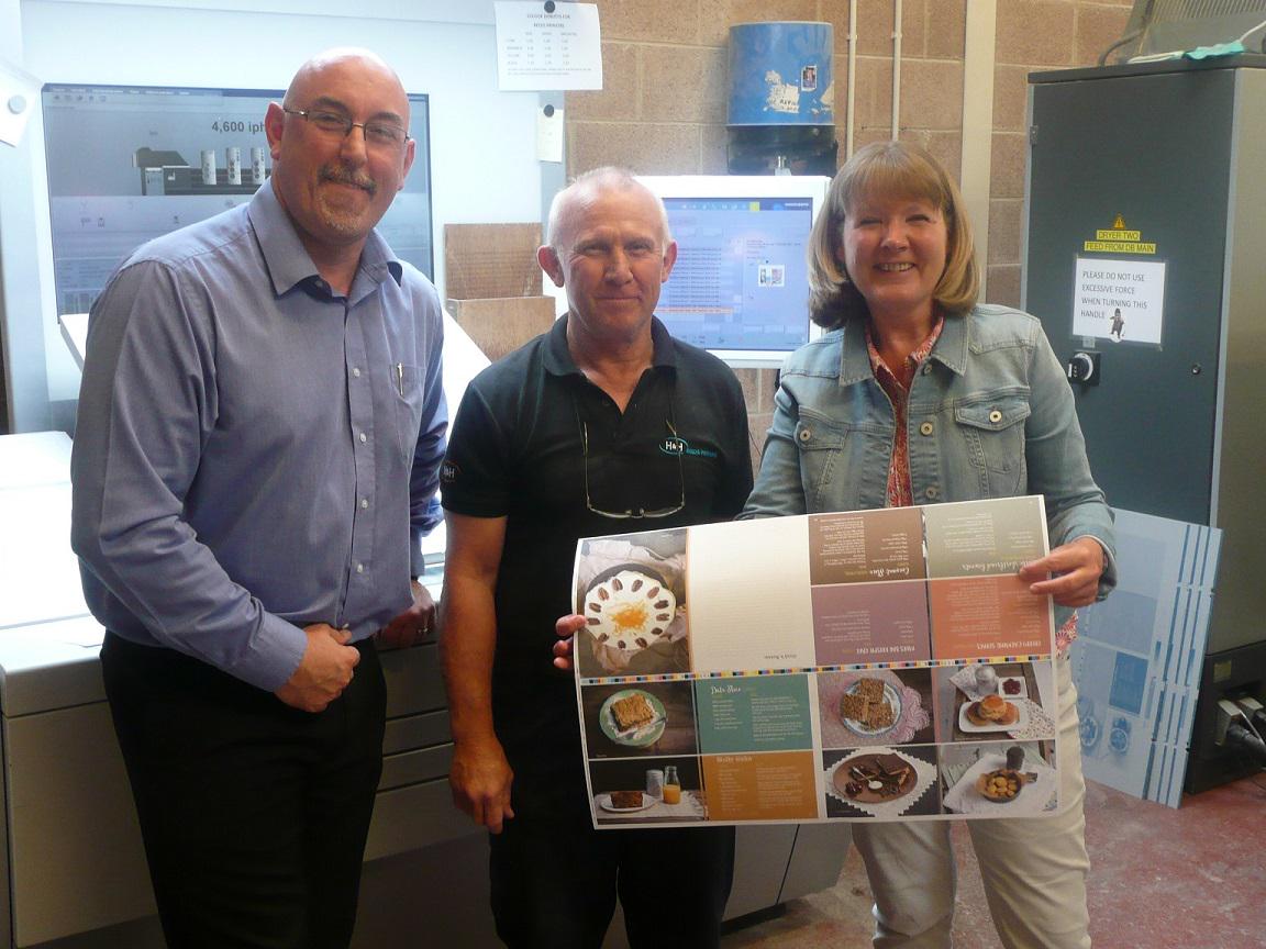 georgefisheruk's tweet photo. Helena, with Rob &amp; Phil of @HHReedsPrint​, printing the first copies of Abraham's Cafe #recipebook. Available soon! http://t.co/druPQ7lNU5