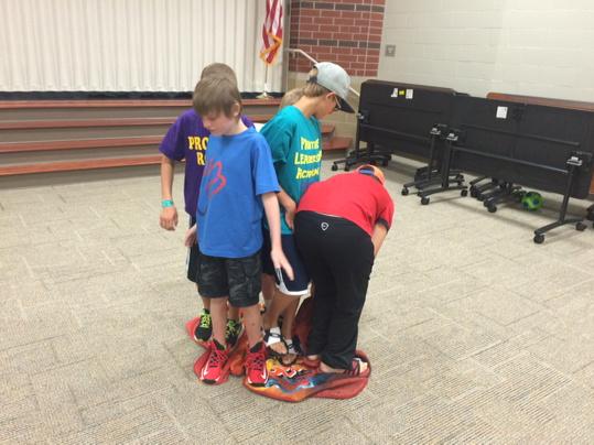 TESPrincipal's tweet photo. Panther leaders "flip the blanket" in leadership training. #pre2015 #8habits http://t.co/GZvZGNO8GC