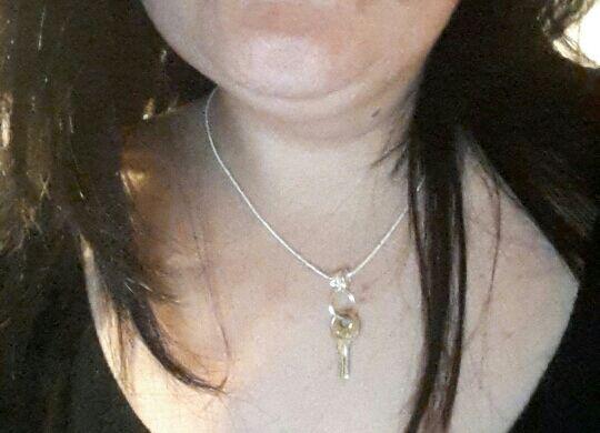 ZMisstress's tweet photo. my new accessory my slave key ti his chastity device he presented me #slave#cuckold#key#chastity http://t.co/UAKFrKqGyT
