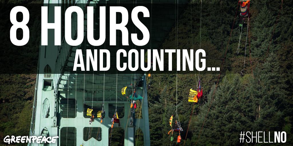 greenpeaceusa's tweet photo. #ShellNo activists suspended from St Johns Bridge for 8 hours and still going strong. RT to show your support. http://t.co/cNWUjgpGBU