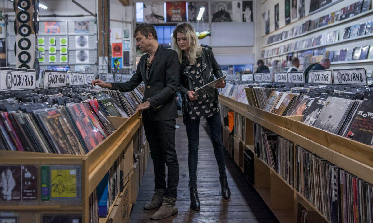 amazonmusic's tweet photo. The Kills go record shopping before their set at Capitol Hill Block Party in Seattle. Photo by David Endicott http://t.co/ag2UAxiQ8a