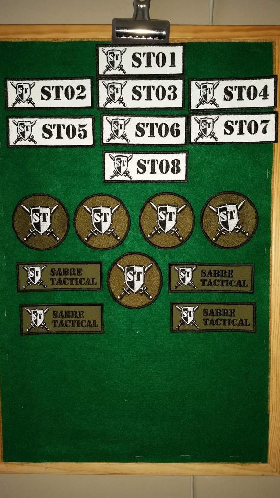 SabreTactical1's tweet photo. Behind the scenes work continues in prep for our 1st game...in the meantime here's our site patches. #StitchMeUp http://t.co/cWlYNgXAlR