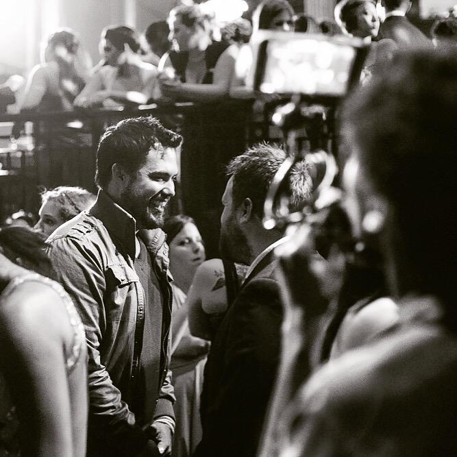 Dystopia2016's tweet photo. Dystopia photo of the day: Michael and Simon share a joke between takes filming the the BIOCORP ballroom scene. http://t.co/IdFLqe682B