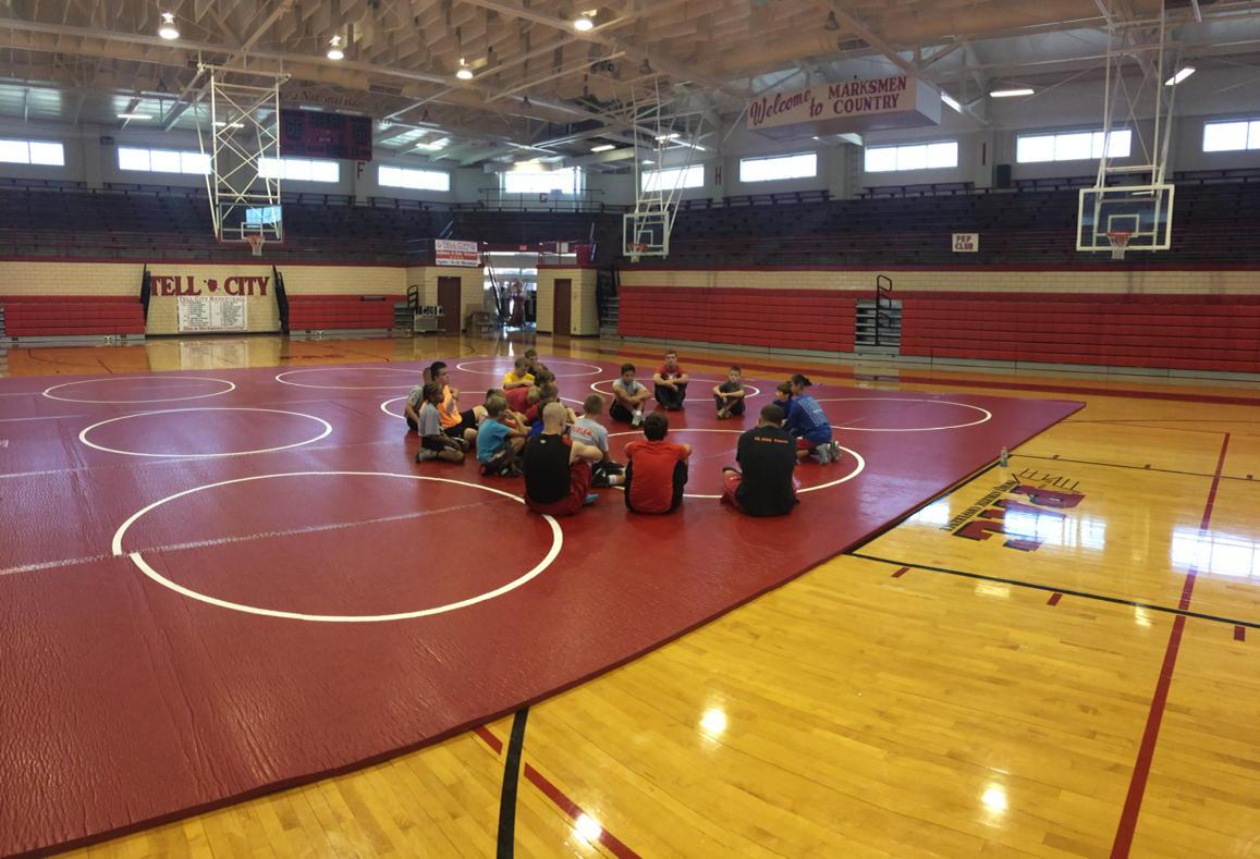 CorneliusStahly's tweet photo. Nothing better than a basketball floor covered by wrestling mats. Welcome to Bryan Taylor Wrestling Arena. http://t.co/8SzCIaDbex