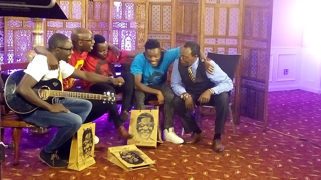 sautisol's tweet photo. And it's a wrap !  Thank you @KoinangeJeff @KTNKenya and #KOT for making #SautiSol the #1 trend in Kenya right now 🙏 http://t.co/lnTj3hVWfJ