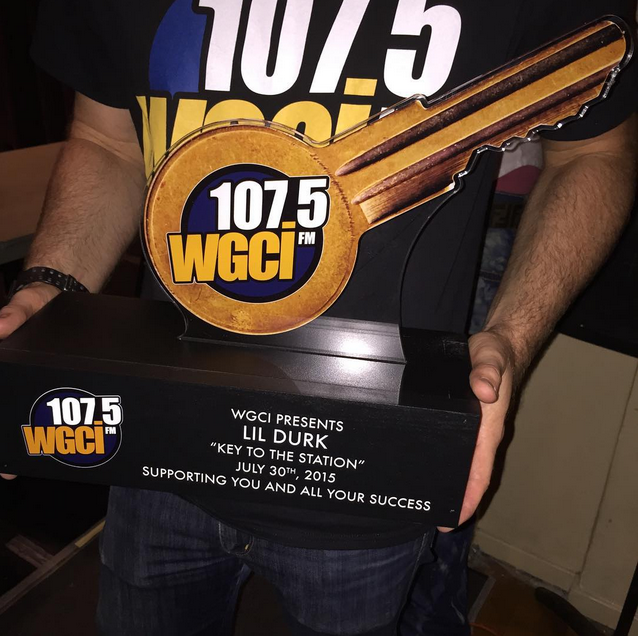 defjam's tweet photo. He's got the key to @WGCI! Congrats @lildurk_ #DURKDAY http://t.co/Gjmc2Uyqx5
