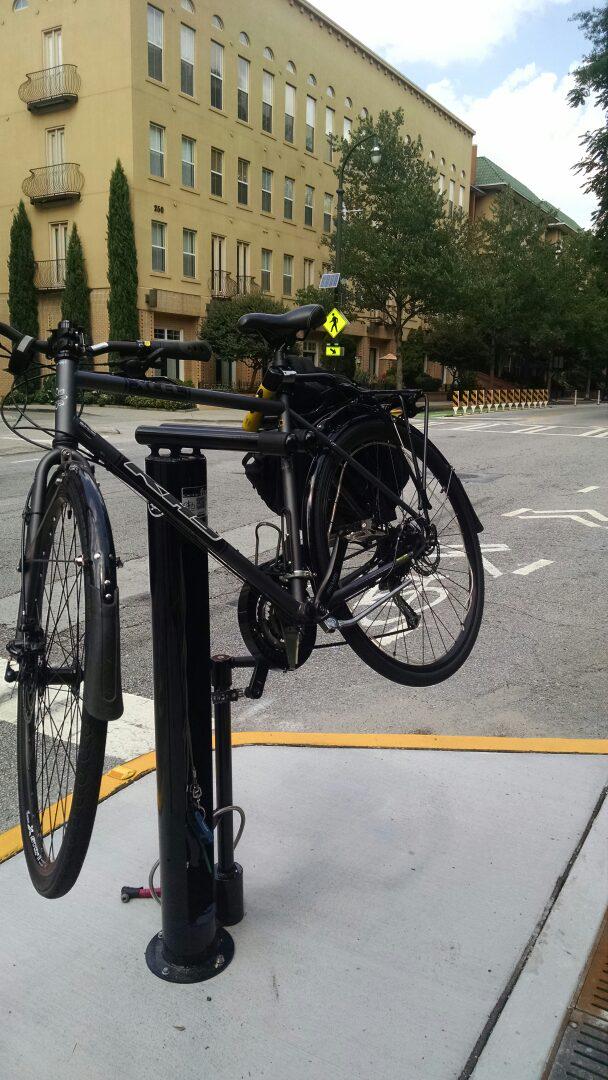 JoeySkills's tweet photo. Quick adjustment on the new maintenance kiosk at 10th and Myrtle! @MidtownATL @atlantabike http://t.co/YjCtWaKJB7