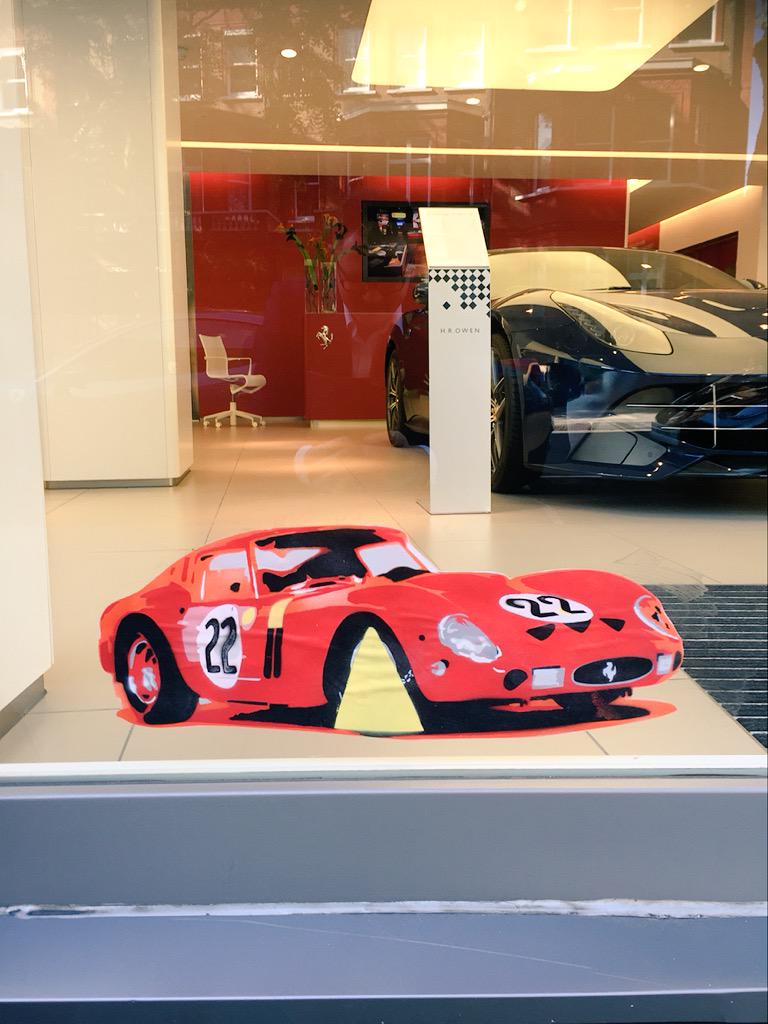 hrowenferrari's tweet photo. Looks like Banksy has been busy on our showroom glass last night... #250GTOClamped http://t.co/9ZsVxFq3W0