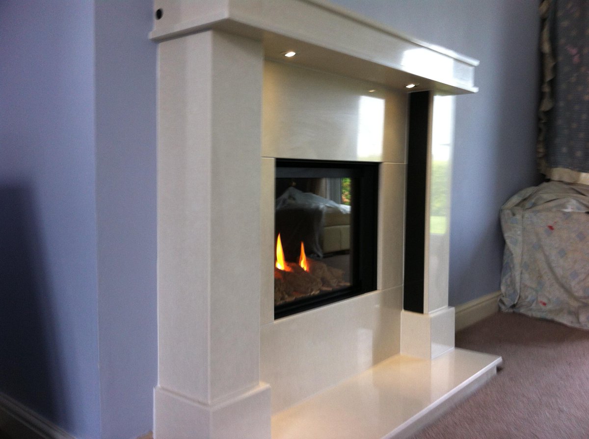The highly efficient P4 glass fronted gas fire, with a bespoke fireplace made to the customers own design <a href="/cJfires/">Charlton & Jenrick</a>