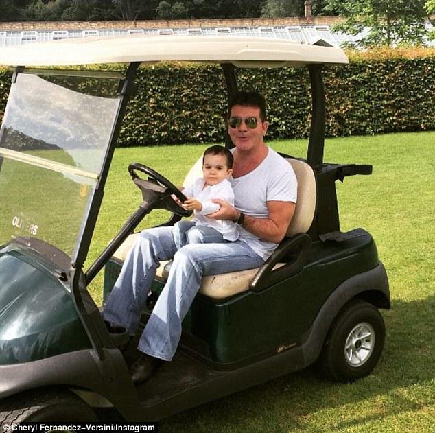 GayFactor's tweet photo. #Gaydad Simon Cowell camps it up w/surrogate son Eric http://t.co/4skLlbeR06 @DailyMailCeleb http://t.co/Gdatf1xAcw
