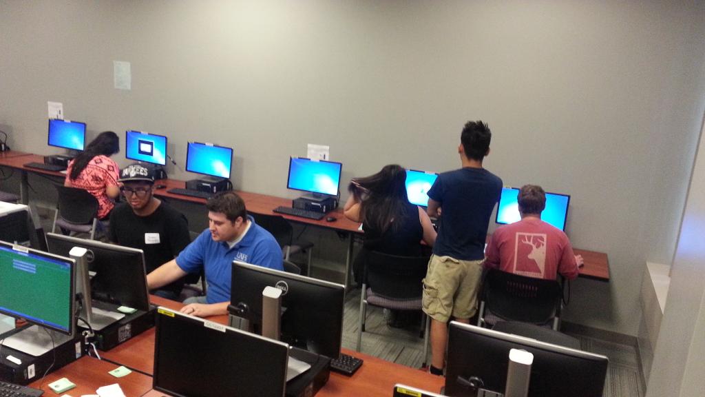 UAFS_Technology's tweet photo. TS staff assist more first-time students with getting their passwords set for the fall term. Welcome! @uafsnso @uafs http://t.co/DN8Xb3VIH7