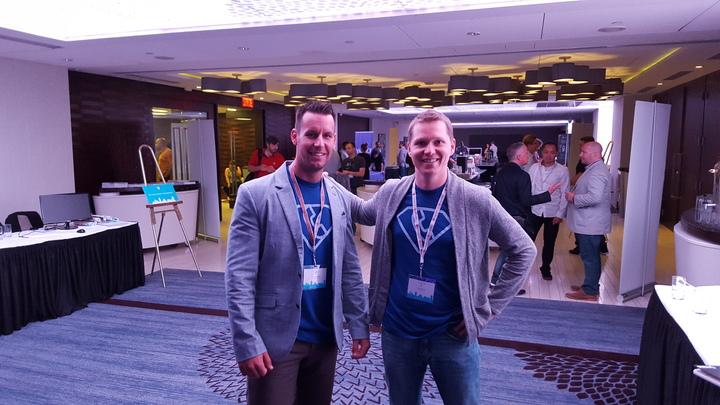 CallRail's tweet photo. Great shot of @mpsulli &amp; @marc_levesque in their CallRail 'call tracking superhero' t-shirts at #ACQSummit! http://t.co/122ABvoTAH