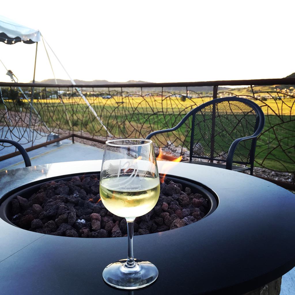 Enjoying a nice glass of Reisling by the fire pit at <a href="/BelleJoliWinery/">Belle Joli Winery</a>! Enjoy this when you book a tour with us!
