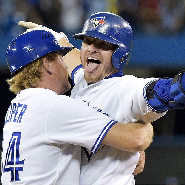 TorontoStar's tweet photo. The definition of clutch: Josh Donaldson drove in the game-winning run in the @bluejays' 7… http://t.co/7GheYugTLO http://t.co/CODGZT5mZO