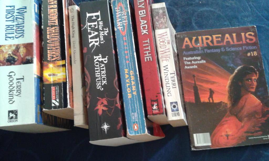 EricaLJudd's tweet image. SO stoked with my fantasy-ish haul from the local Book Affair today, especially the @AurealisMag #18!