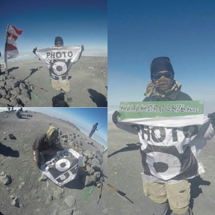 PhotoUP94's tweet photo. Ketua Photo UP @tatafirza mengibarkan bendera @PhotoUP94 diatas gunung Mahameru untuk pertama kalinya. http://t.co/xnFf4apnfj
