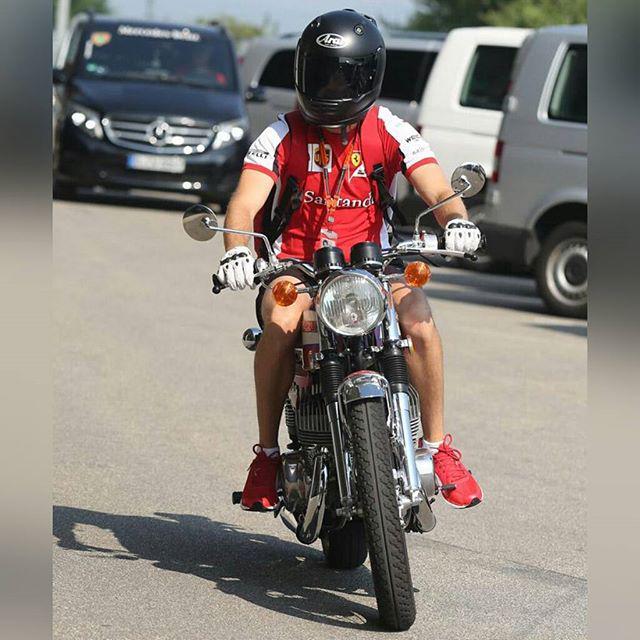 raddie_cz's tweet photo. Sebastian Vettel riding his Suzuki T500 to the Hungaroring last week

#SebastianVettel #Vettel #Seb5 #SV5 #SebVette… http://t.co/hCUoj5yKrZ