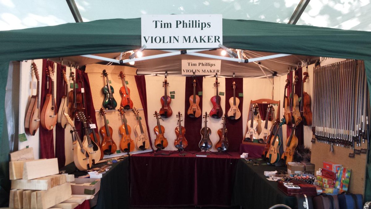 TimViolins's tweet photo. Come and see us in Blackmore Gardens, Sidmouth. The stalls all ready for customers! http://t.co/QjEMwQtAzN