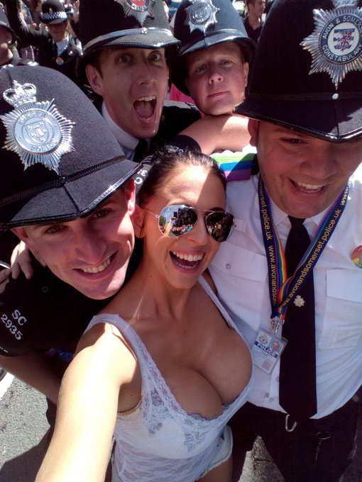 Has to be my fav pic of #pride2015 photo bombed by Brighton police love it xxx http://t.co/Rbv3V6Vos<a href="/tag/pride2015"class="tags">#pride2015</a>