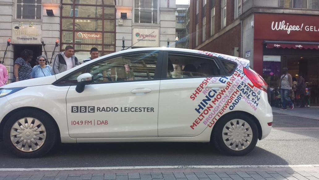 Vitruviusuk's tweet photo. @BBCLeicester Your news car #photobombed our pics twice today😢 as our staff were joining in the #CaribbeanCarnival http://t.co/hyRnLG4rwV