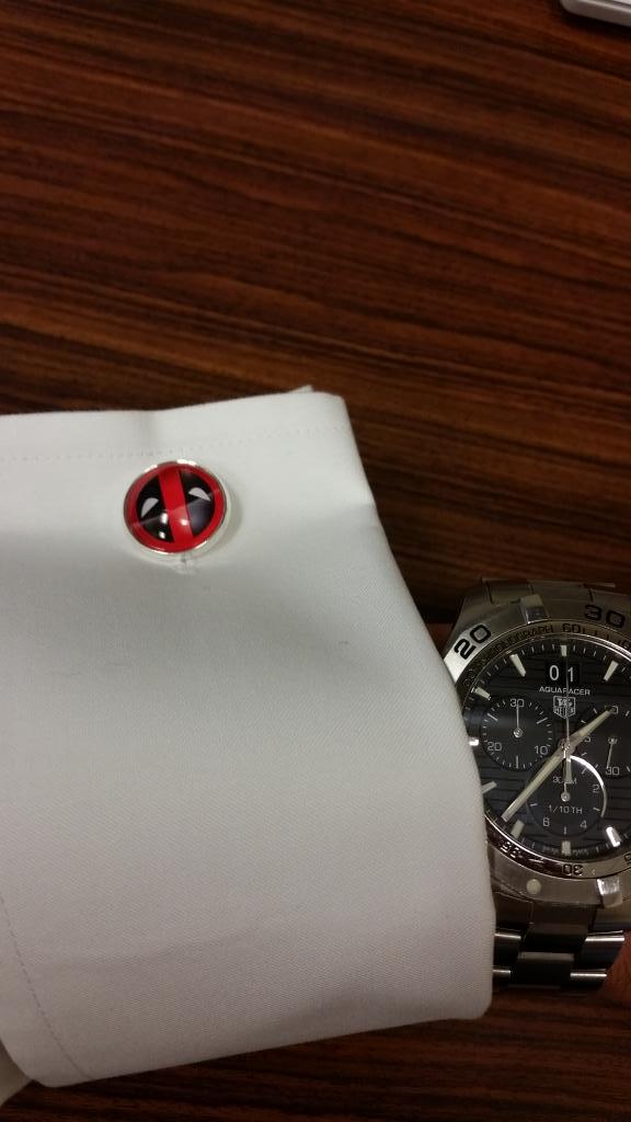 travisstpeter's tweet photo. @VancityReynolds boss asked what my cufflinks mean, what should i tell him?
#deadpool http://t.co/63ePIUZei7