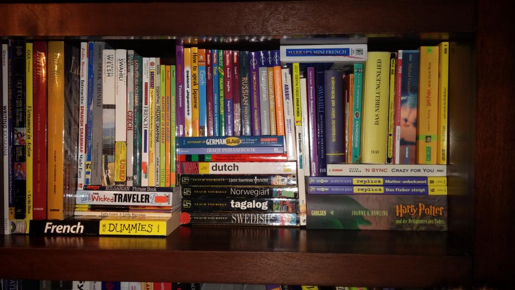 neskirderf's tweet image. Had to give my phrase books and foreign language books their own shelf! Still full. #linguistproblems