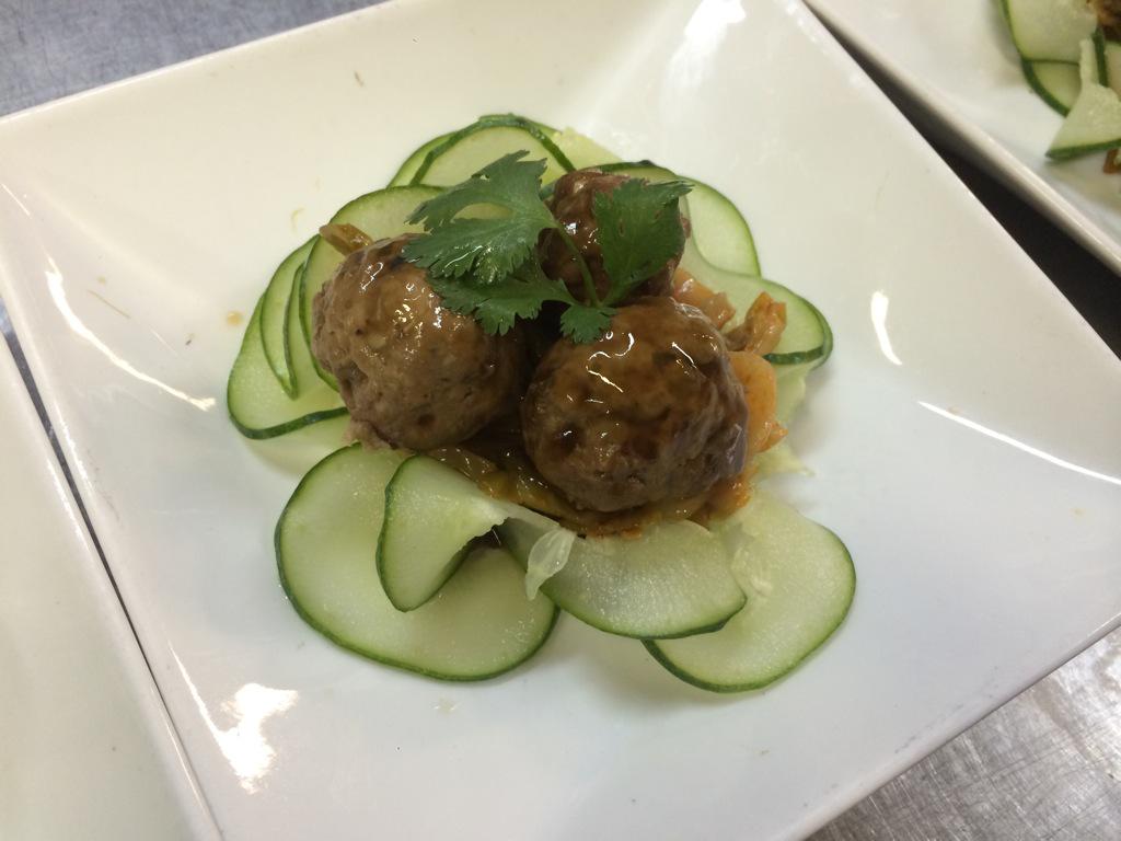 OneBlockWest's tweet image. Bird eggs on a nest. Ginger pork meatballs on nest of pickled mustard stems and cucumbers. #livefromobw