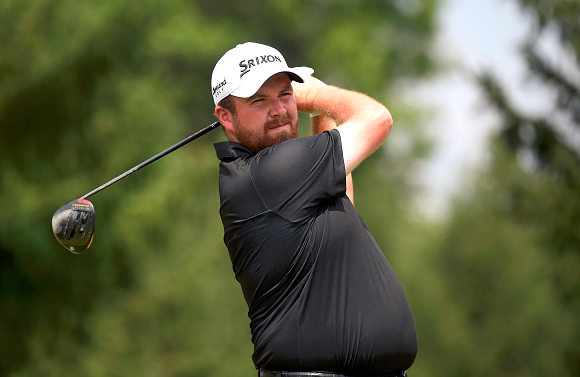 SkySportsGolf's tweet photo. Shane Lowry holds a narrow lead at the #WGCBridgestone. Live now on SS4: http://t.co/bnSahbwzTN #GolfOnSky http://t.co/6zumuLzJWY