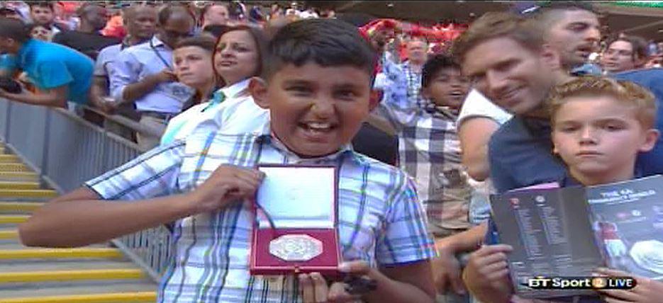 Heres the lucky lad who got Jose Mourinhos medal after Arsenal beat Chelsea [Pictures]