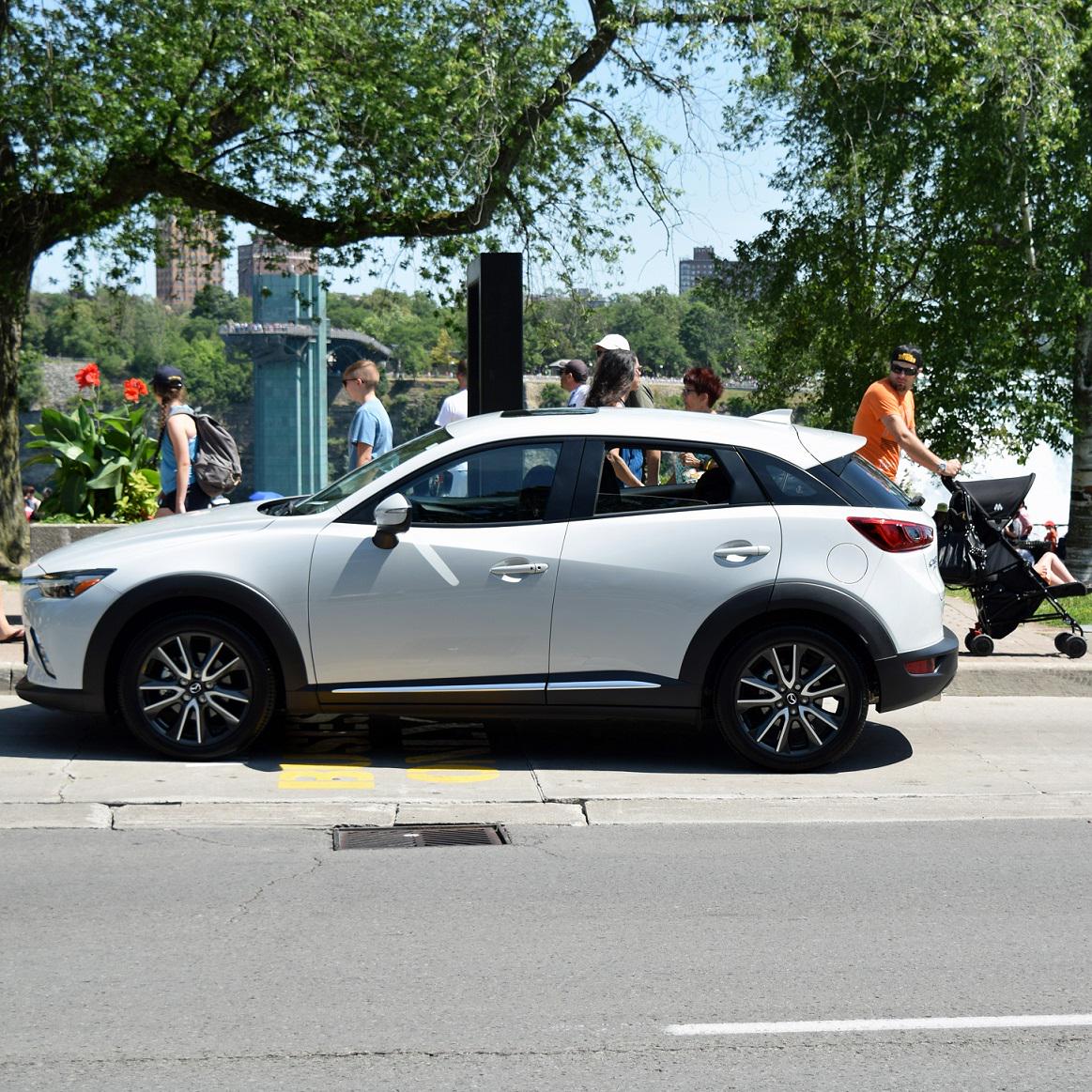 Listen2Lena's tweet photo. @mazdacanada LOVE that I caught this random dad checking out the #FirstEverCX3! He stopped to chat w/ us - "HOT car!" http://t.co/0t4lxdqiwL