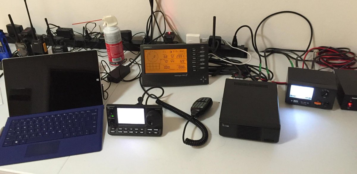 tugrik's tweet photo. The HF rig: Surface tablet, Icom 7100, Vantage Pro 2 (wx station) and SWR meter. #tinyshack #hamradio Need real desk! http://t.co/9dM7S6QbHD