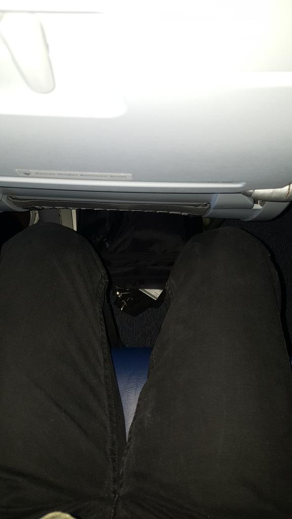 bwmb's tweet photo. I Don't tweet much, but felt compelled.  #UnitedAirlines I'm only 5'8" and sitting as far back as possible.... http://t.co/tVNVJkDNHm