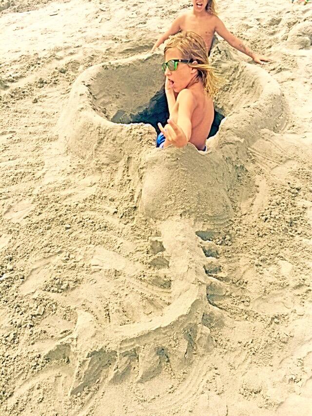 The beach happened. Oh, and a sand made hot tub!  #twins #summerTimeFun