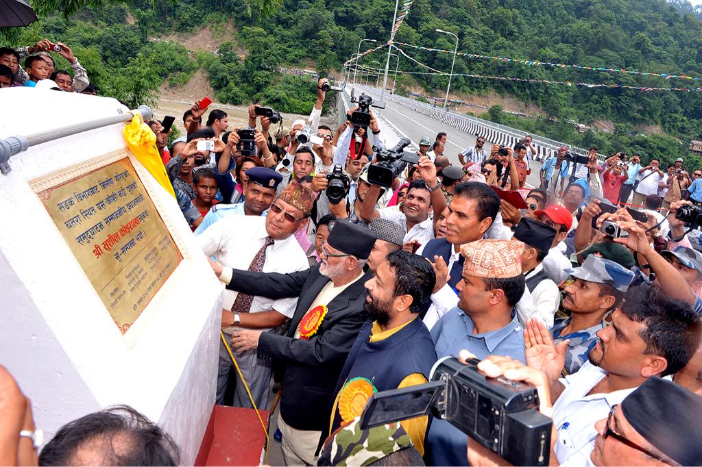 ADB_HQ's tweet photo. Newly constructed #KoshiBridge restores transport link & economic activities in eastern Nepal http://t.co/InBkxK9fxg http://t.co/hazap9QVRh
