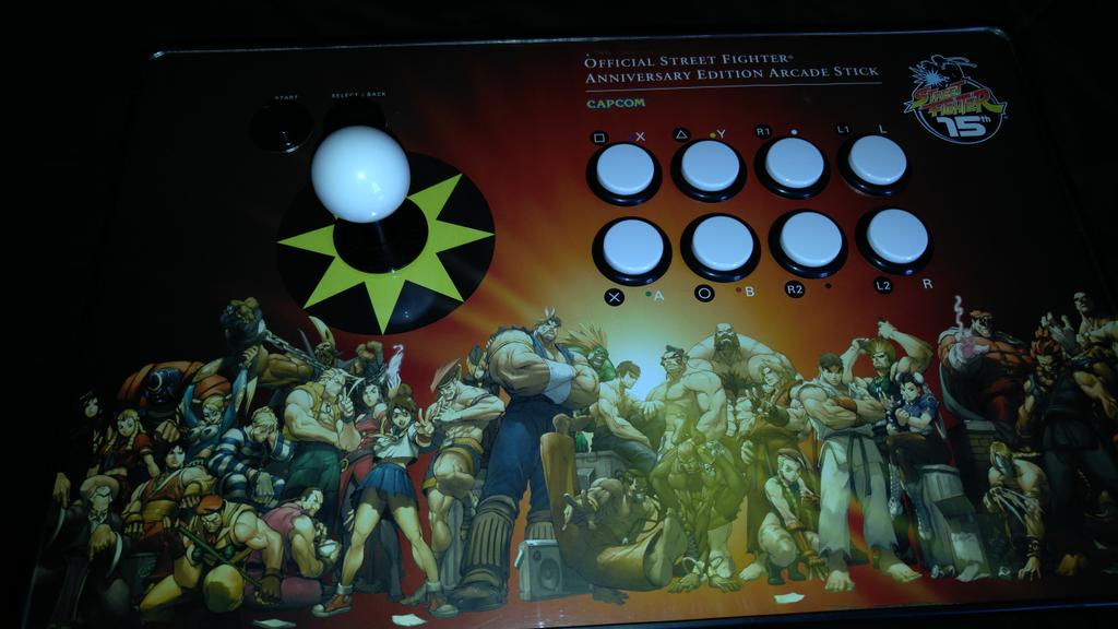 ZeroCoin's tweet photo. Thanks to @focusattack my old @StreetFighter 15th anniversary stick is ps4 ready with that fantastic @UdonEnt art! http://t.co/3UPItSDU7T