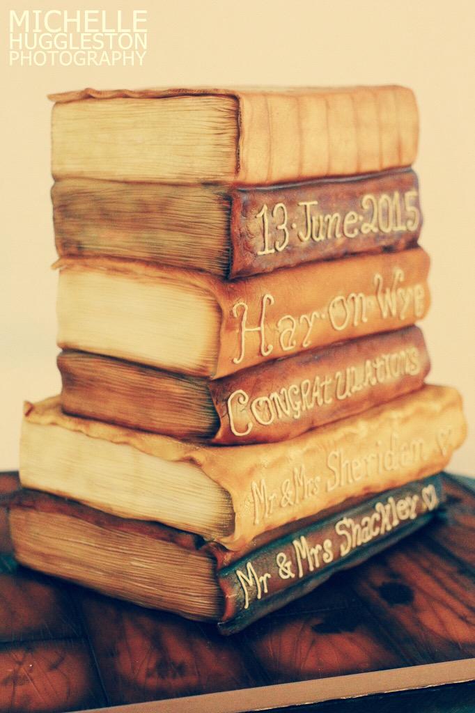 VelvetCakery's tweet image. @CakeMasters here's our book wedding cake we made for a wedding in the biggest book shop in the world #hayonwye