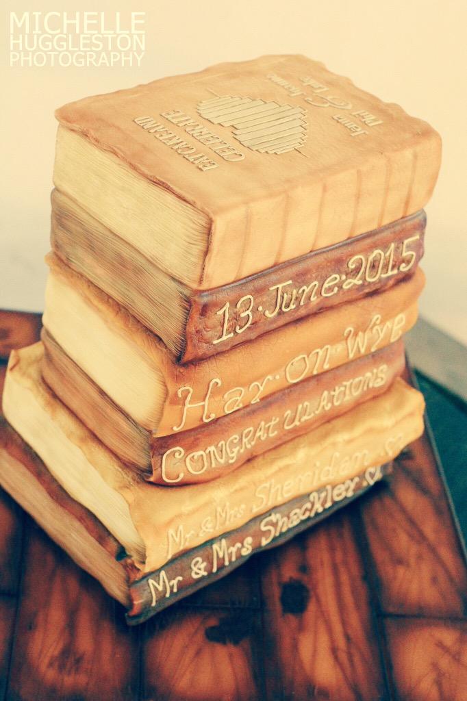 VelvetCakery's tweet image. @CakeMasters here's our book wedding cake we made for a wedding in the biggest book shop in the world #hayonwye