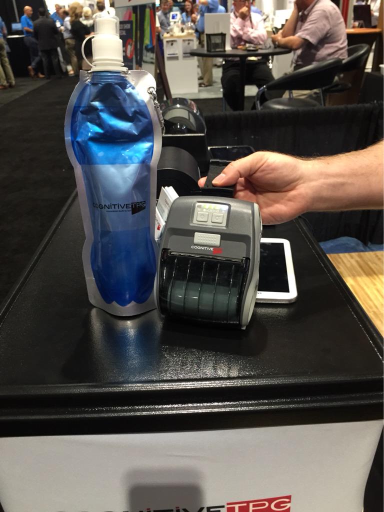 CognitiveTPG's tweet photo. #M320 mobile printer paired with an IP54 case, it likes water.  Come get your @CognitiveTPG free water bottle. http://t.co/MESfek2TYV