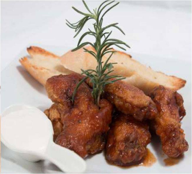 MahoganyTreeJa's tweet photo. #SpicyChickenWings! Come on by #MahoganyTreeBar inside #DevonHouse for #lunch! http://t.co/eMuYUx8j2q