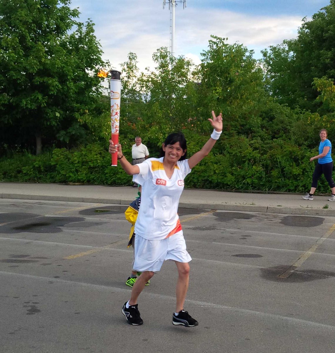 OLGtoday's tweet photo. OLG's Marychelle shines as bright as Parapan Am flame at Bayfront Pk Hamilton 
#celebrateandshare
#allforhere http://t.co/DOA83lmcn3