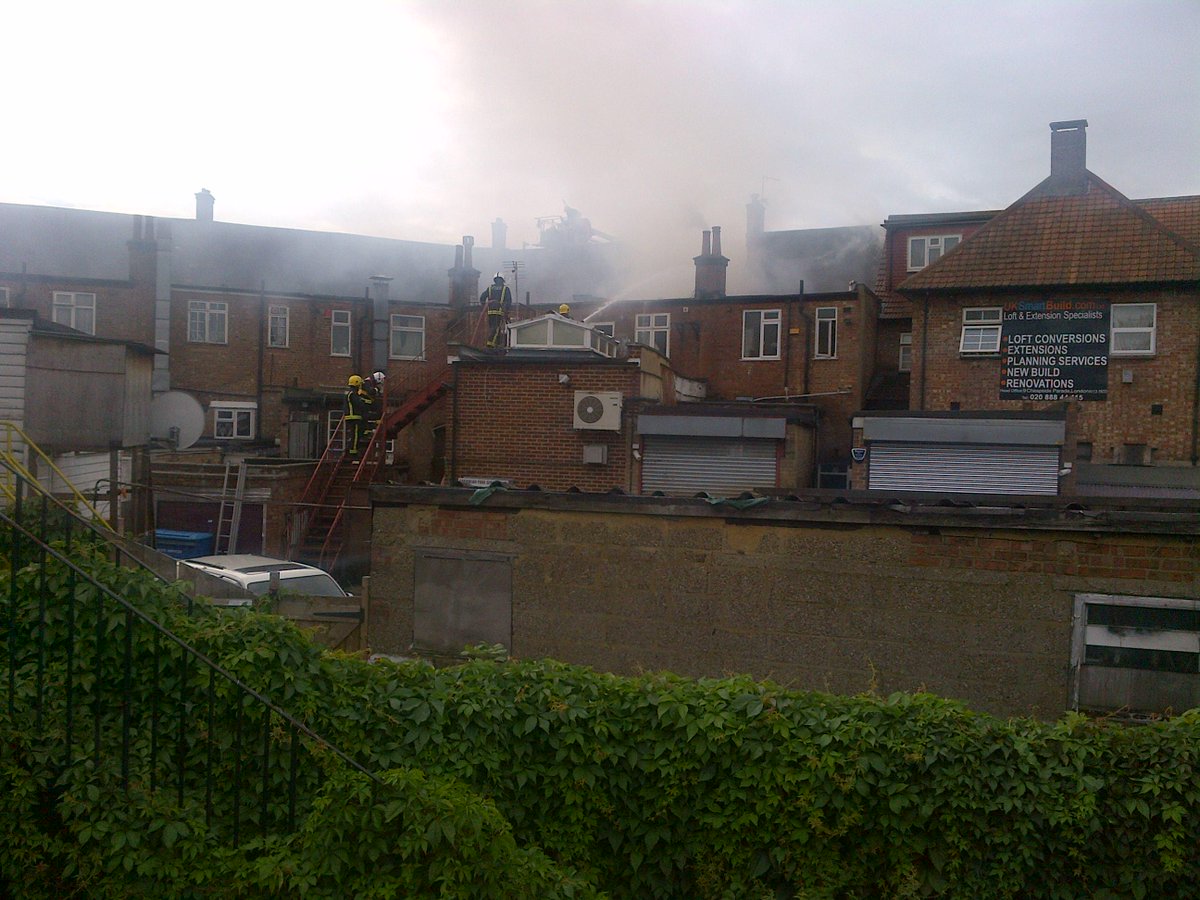 Fire engines tackling blaze in a restaurant in Palmers Green London