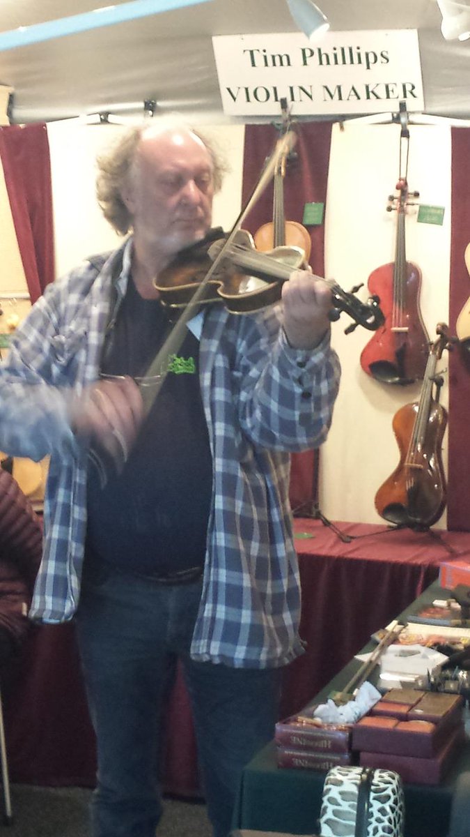 TimViolins's tweet photo. Playing on the stall today Dave Sheppard @blowzabella. @sidmouthfolk http://t.co/YG6ff3aYQv