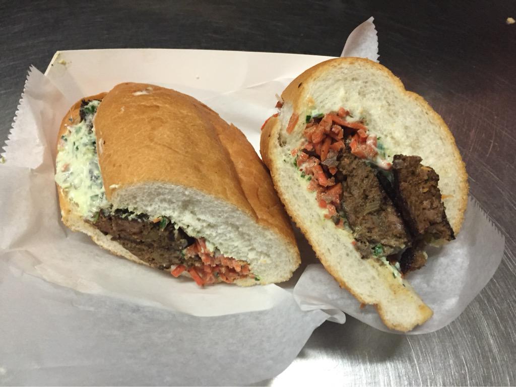 killerpoboys's tweet photo. Back by popular demand.... The lamb loaf poboy with tzatziki and sumac marinated carrots! http://t.co/j02y6R94OY