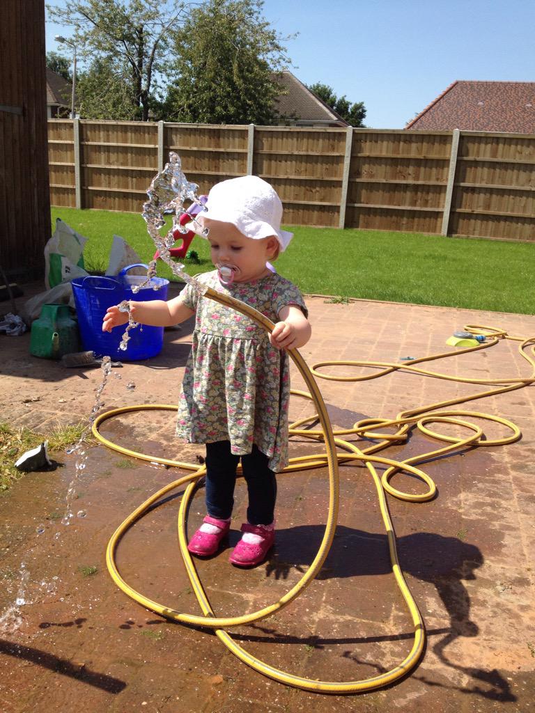Helping daddy tidy up for the day